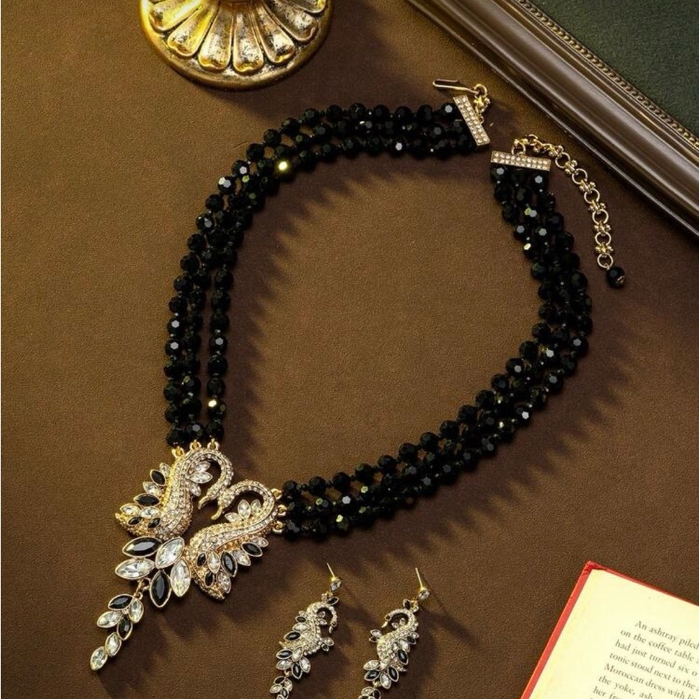 Glamorous Black and Gold Necklace with Earrings in a Swan motif